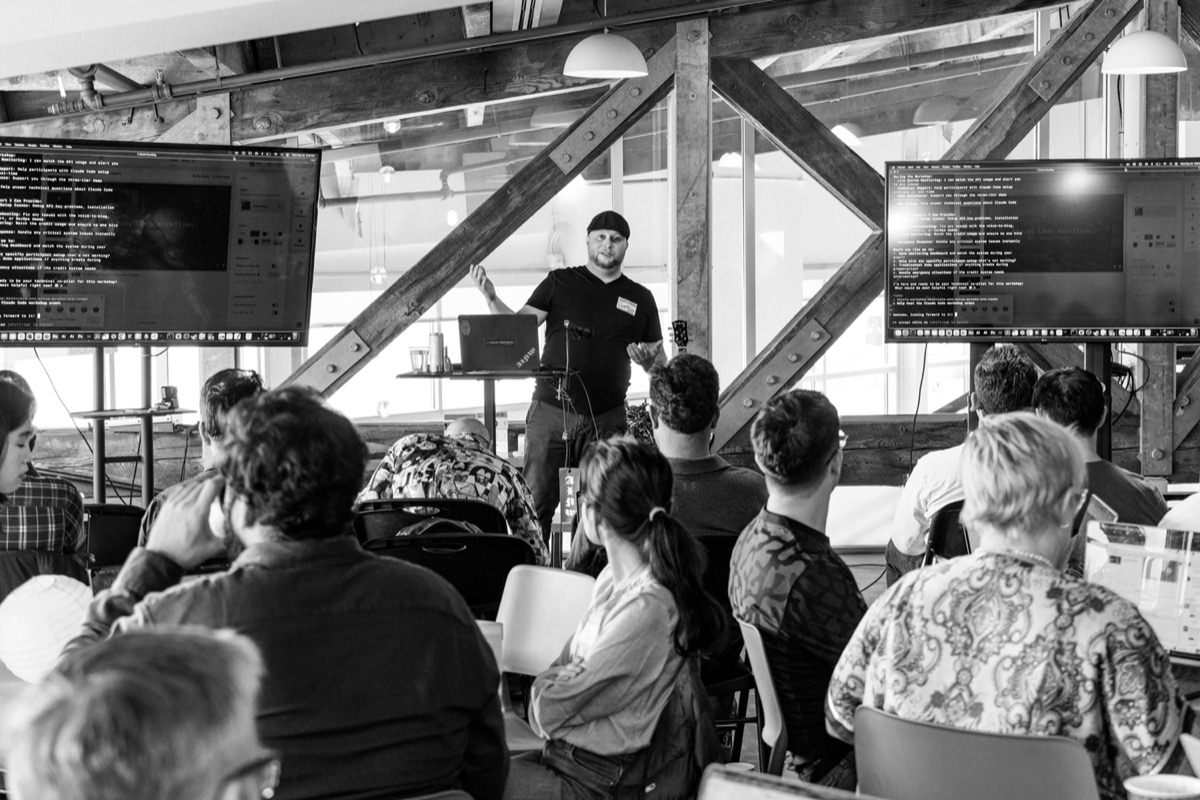 AI Northwest speaker presenting to engaged audience at Seattle tech event